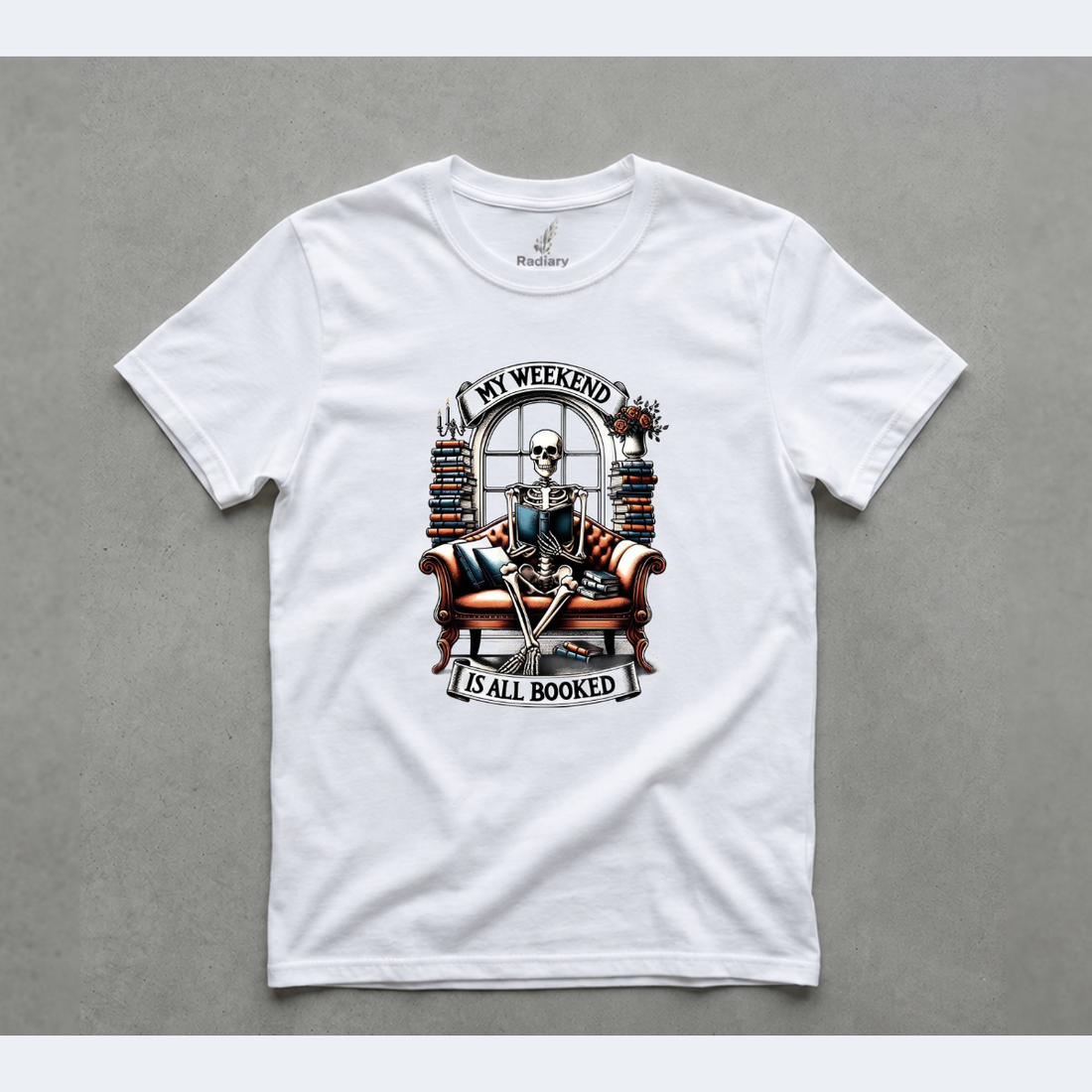 White book-themed graphic T-shirt from Radiary’s Book Lover collection, shown flat on a gray background.